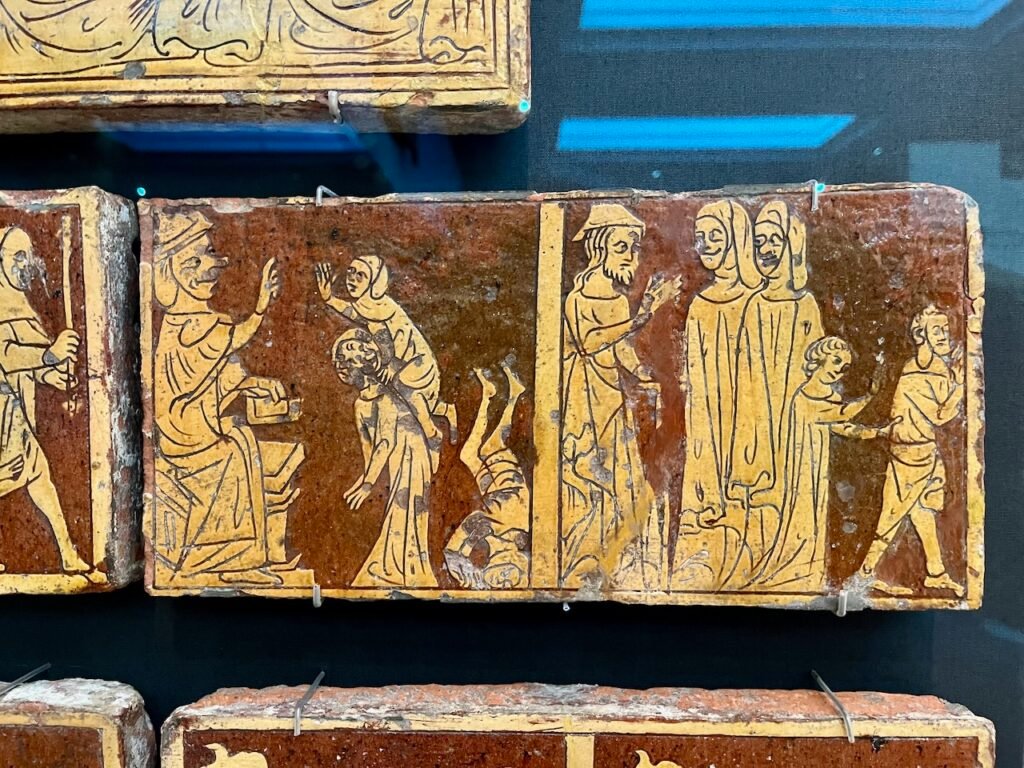 Medieval tiles showing scenes from the early life of Jesus.